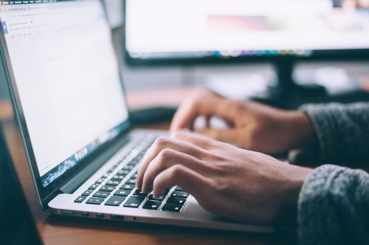 Laptop open for focused typing practice